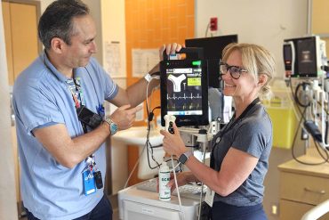 After receiving specialized training, Nurses Benjamin Rolea and Carla Peters from the Vascular Access Team provide advanced vascular services to JGH patients.